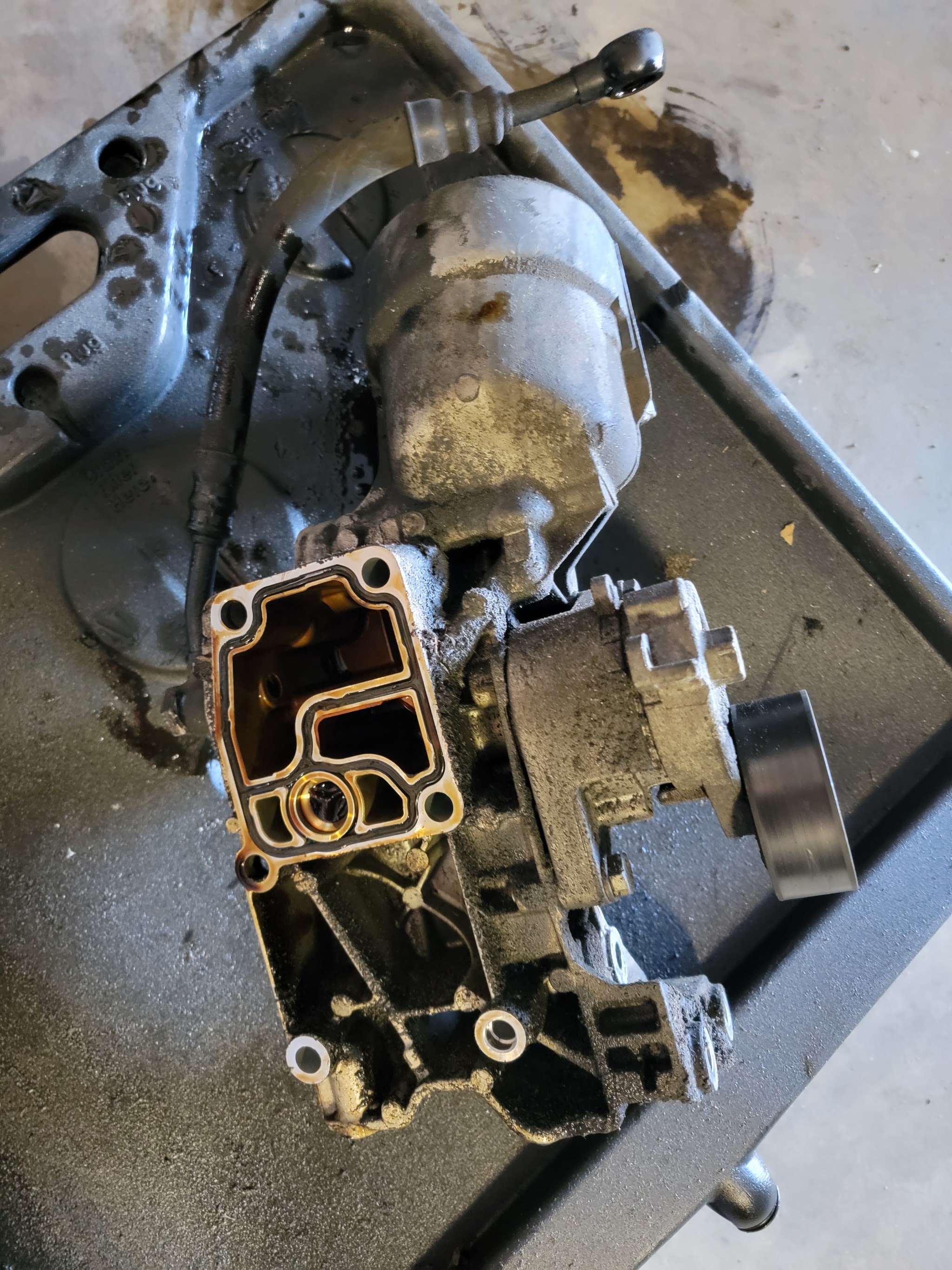 An engine oil pump housing on the work bench