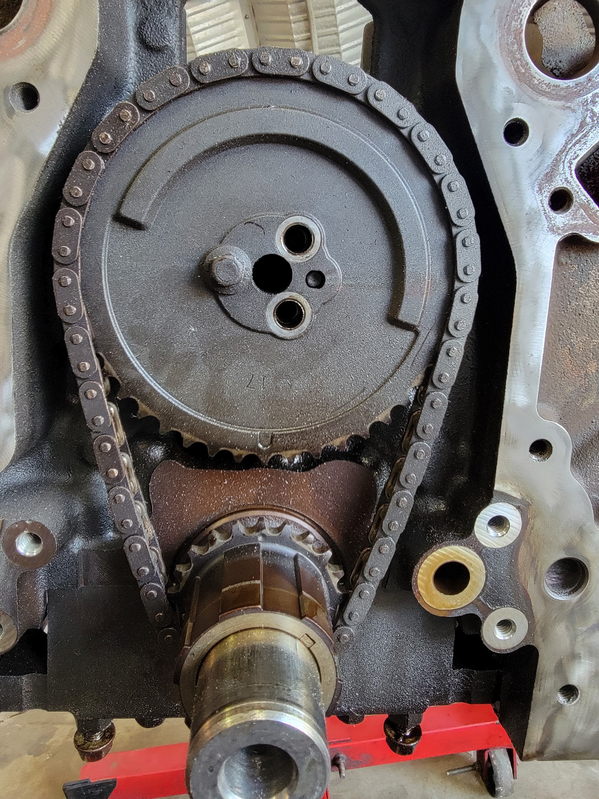 Timing chain and sprocket on an engine front